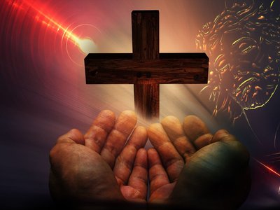god's hands holding a cross